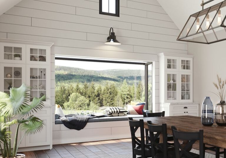 Interior image of home showing Marvin Skycove windows with a view of the hillside.